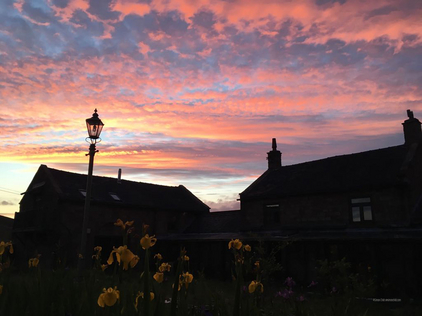 Sunset over the house